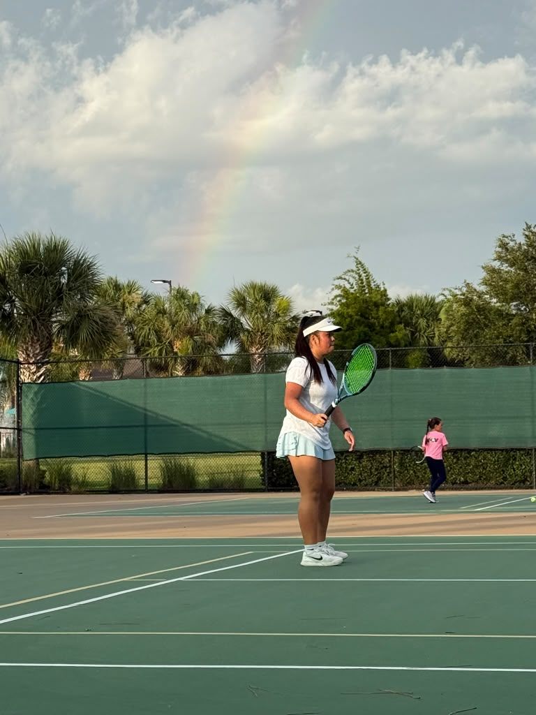 Player under a rainbow